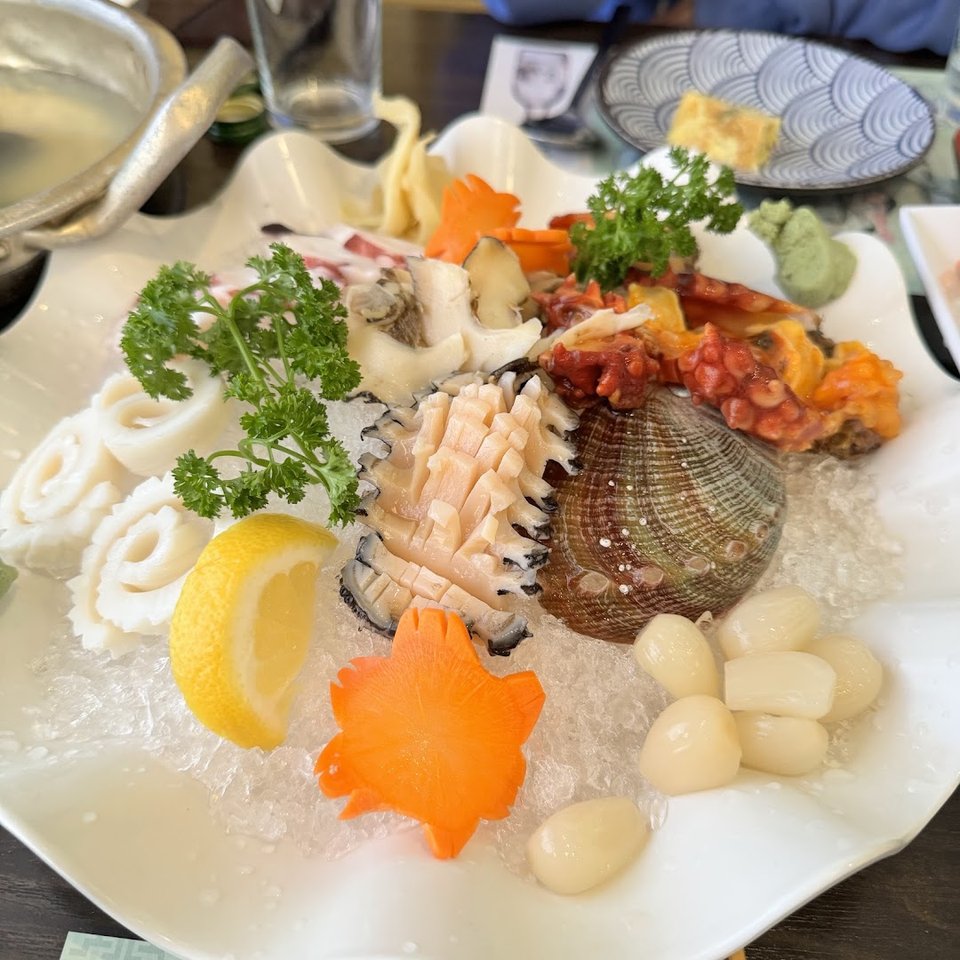 Colorful assortment of rolls and seafood.