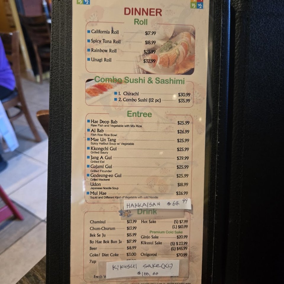 Menu page listing seafood entrees and sides.